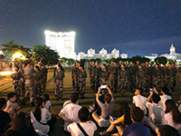 Participants watch the marching performance of HNU military training students (Programme Host: Hainan University)